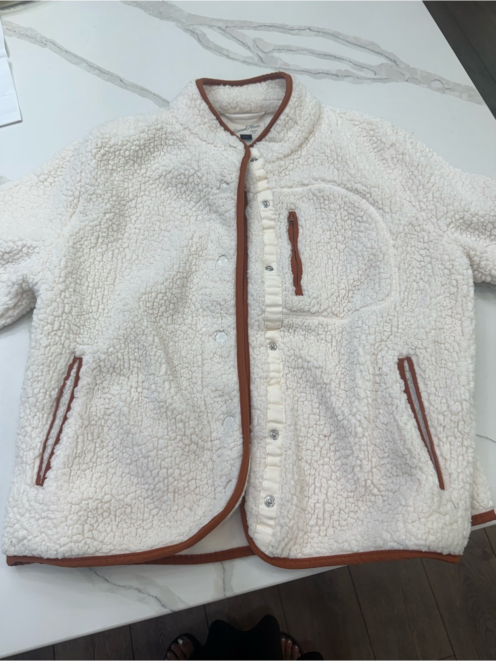 Women’s Cream Sherpa-like Jacket with Brown Trim - Universal Thread Goods.